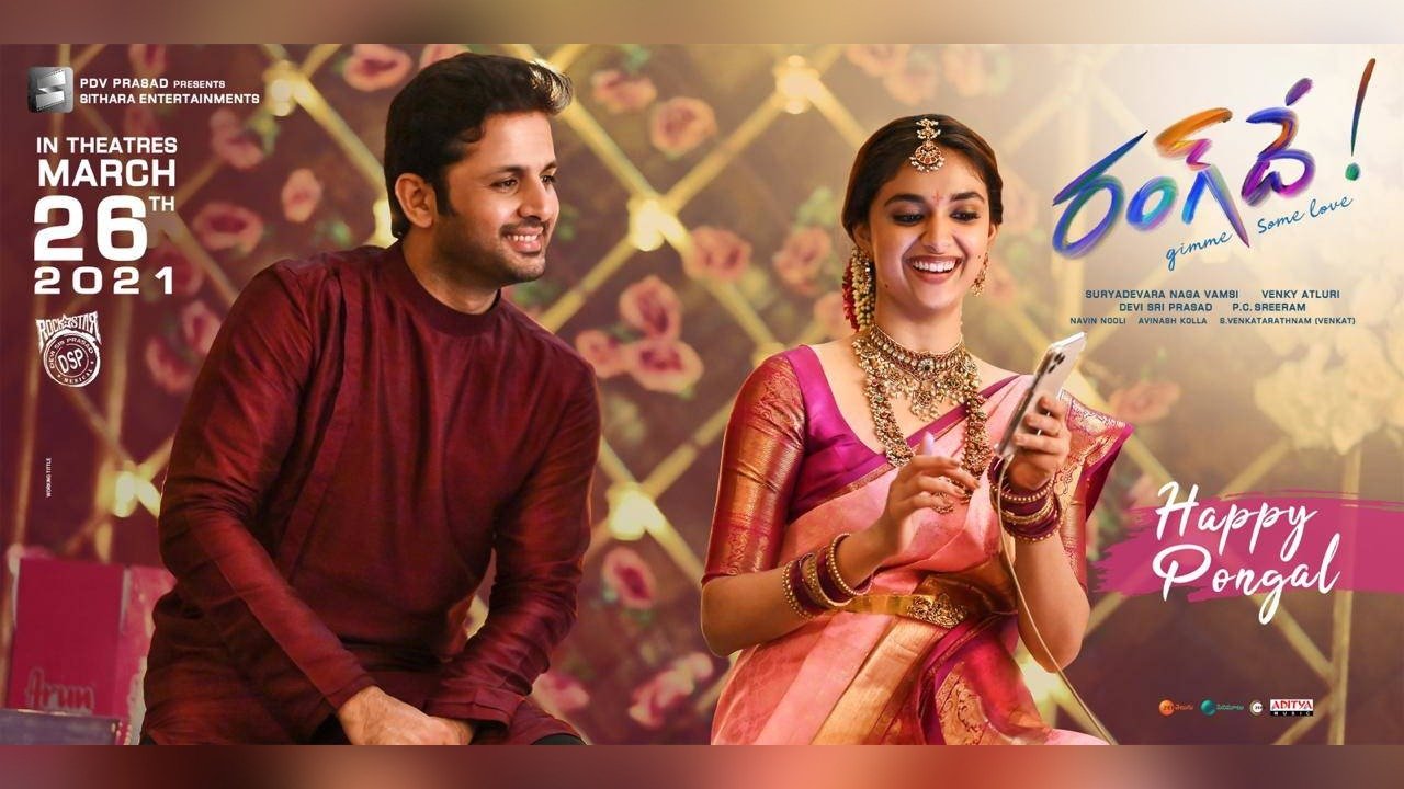 Keerthy and Nithiin in wedding outfits