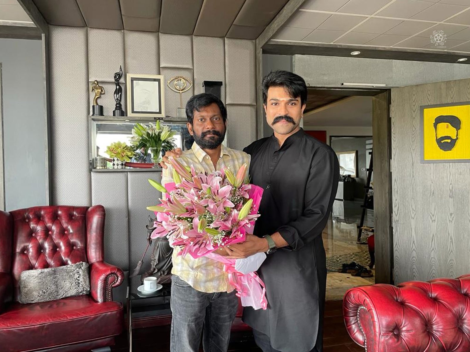 Buchi Babu thanks Ram Charan for his support
